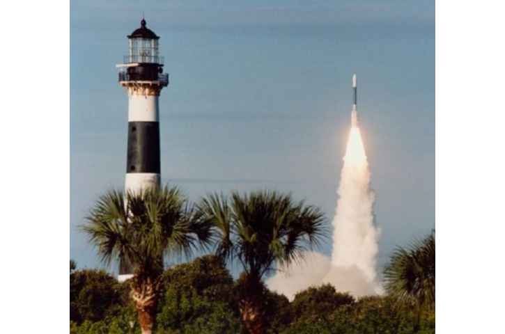 Canaveral Lighthouse and rocket launch