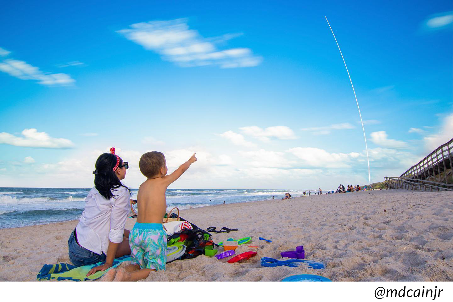 family watching rocket launch